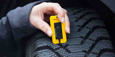 Quelle est la profondeur minimale en millimètres du profil du pneu?